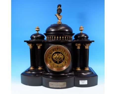 A black slate architectural mantel clock, with French 8 day striking movement, bears silver presentation plaque dated 1900, w