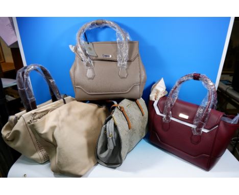 A Fiorelli Asher large grab, white cut out, with tag, and an Aniya python print shoulder, with tag; a Modalu Hemingway berry 