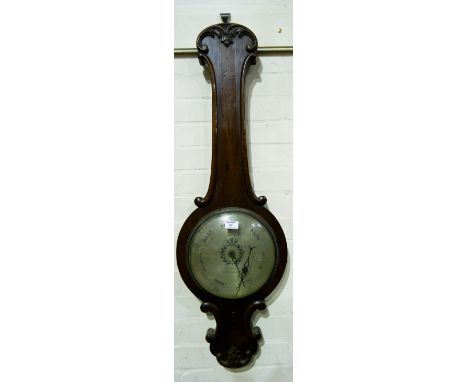 A 19th century large mercury column barometer in mahogany banjo shaped case, with carved decoration and silvered scale, by Ag
