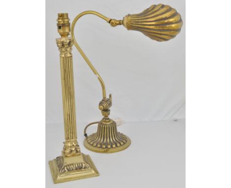 A pair of brass column table lamps, 40cm, a desk lamp, etc.