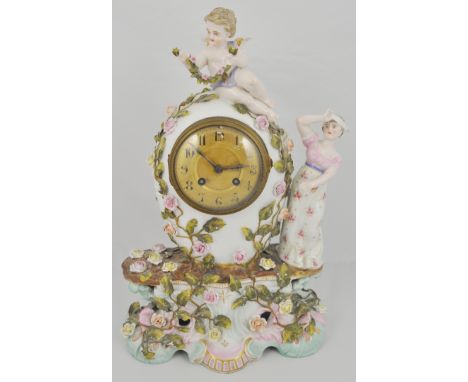 Continental porcelain mantel clock, ovoid urn shape form, cherub finial, an attendant lady, scrolled base, floral encrusted a