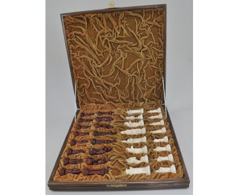 Modern chess set, Oriental style and a collection of thimbles with display shelf.