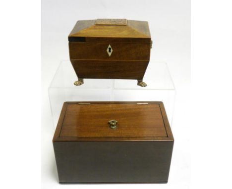 A GEORGE IV MAHOGANY TEA CADDY OF SARCOPHAGUS SHAPE, THE LID WITH BURR YEW PANEL, BRASS MOUNTS AND A MAHOGANY BOX