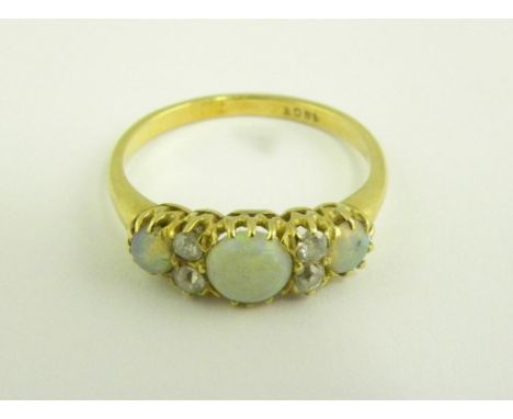 AN OPAL AND DIAMOND RING, IN GOLD, MARKED 18CT, EARLY 20TH C, 3.5G