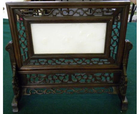 A CHINESE CARVED JADE SCREEN PANEL OF FIVE CRANES, PRUNUS AND ROCKS IN PIERCED WOOD FRAME AND MATCHING STAND, C FIRST HALF 20