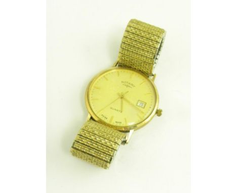 A ROTARY 9CT GOLD ELECTRONIC GENTLEMAN'S WRISTWATCH WITH CENTRE SECONDS AND DATE THE BACK ENGRAVED WITH A PRESENTATION INSCRI
