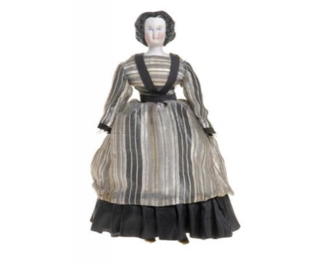 AN AMERICAN CLOCKWORK AUTO PERIPATETIKOSS WALKING DOLL the bisque shoulder head with moulded and glazed black curly hair, pai