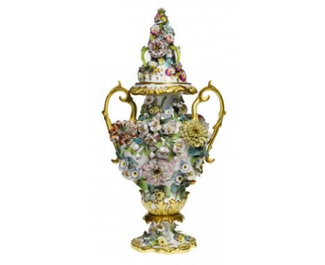 A SAMUEL ALCOCK FLORAL ENCRUSTED POT POURRI VASE AND COVER OF TWO HANDLED OGEE SHAPE APPLIED WITH A PROFUSION OF BRIGHTLY COL