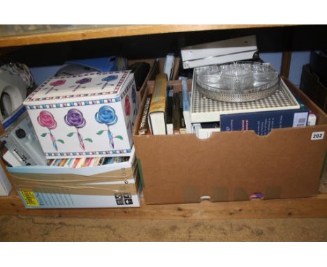 Shelf of assorted books and DVDs