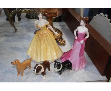 Three Beswick dogs and two figures