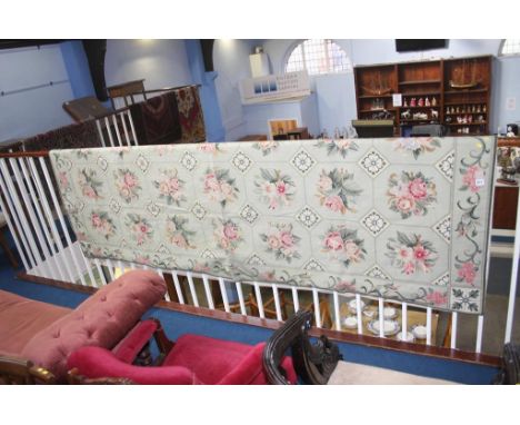A large petit point tapestry, decorated with roses, 270 x 180cm (approx.)