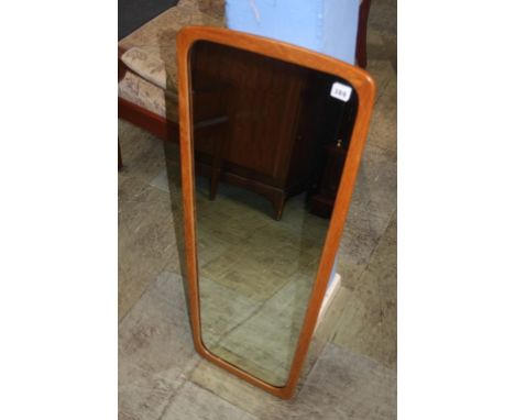 Teak framed mirror and a standard lamp