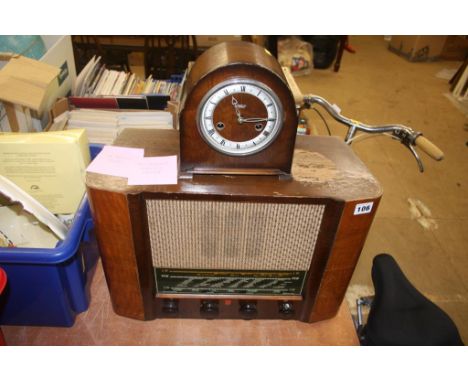 Walnut radio and a mantle clock