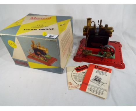 A Mamod steam engine with related literature in original box