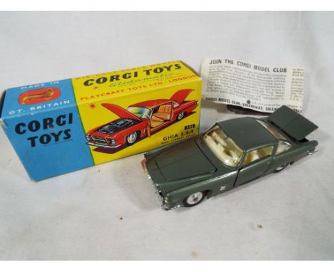 Corgi Toys - a Ghia L.6.4 with Chrysler engine # 241 rare metallic moss green, white interior with dog on rear parcel shelf, 