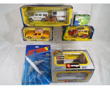 A small mixed lot of diecast models to include a Corgi Mounted Police Set # 44, a Corgi Chevrolet Caprice Taxi # 327, a Corgi