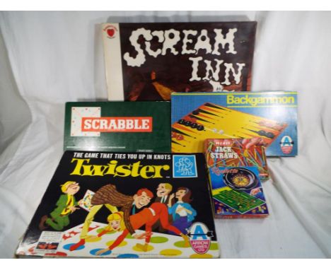 A mixed lot of vintage board games to include a Pirate shooting game, The Scream Inn, Haunted house by Denys Fisher, Twister,