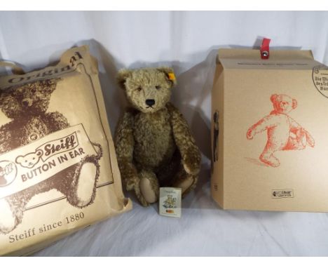 A Steiff Bear, growler, button in ear, with ephemera and original Steiff bag - Est £40 - £60