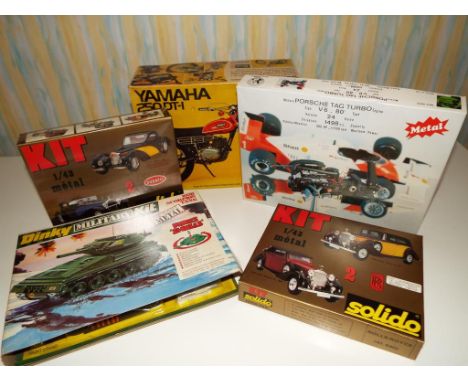 A quantity of model maker’s kits to include Solido 1:43 scaleBugatti # 5401, Rolls Royce # 5402, Dinky Military kit, Scorpion