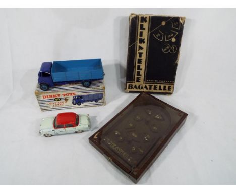 A Dinky Guy 4-ton Lorry, blue # 911, exc in good original box, a Corgi Standard Vanguard III and a Klikatelle Bagatelle in or