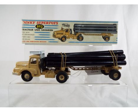 French Dinky Supertoys - a boxed Tracteur Unic Sahaien (Unic Sahara Tractor), model 893, fawn and white with pipe carrier, se