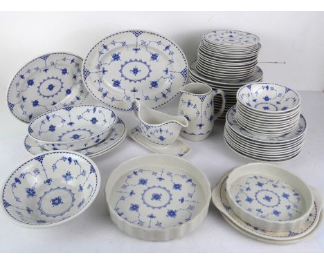 An extensive part-dinner service of Denmark pattern dinner ware by Johnson Bros., Furnivals and Masons - comprising a 35cm. o