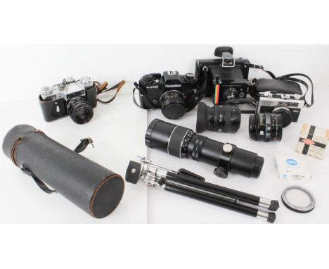 A collection of 35mm cameras and accessories - including a&nbsp;Rolleiflex SL35ME Camera with HFT Planar f1.8 50mm lens, M42 