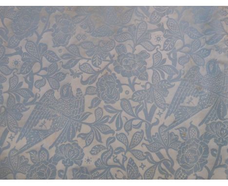A pair of vintage curtains, pelmet and swagged tie backs in a powder-blue damask silk fabric with exceptional passementerie; 
