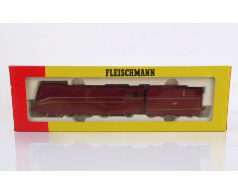 A Fleischmann HO gauge 4173 4-6-2 streamliner steam locomotive and tender - no. BR 03 in maroon DRG livery with German Imperi