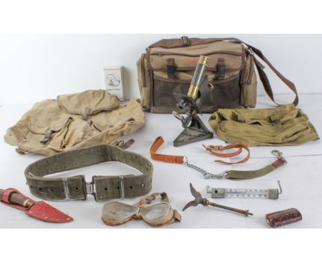 A mixed lot to include: three crayfish traps and a long-net; a late 19th to early 20th century monocular microscope by R&J Be