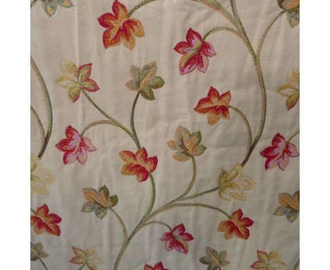 A pair of curtains with tie backs in a heavy tapestry effect fabric from John Lewis; triple pinch pleat heading, cream cotton