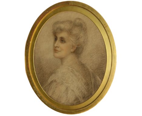 Pre-Raphaelite School (late 19th century) Portrait of a lady oval, charcoal and red chalk, signed indistinctly lower right, p
