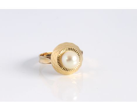 A vintage yellow gold and single pearl ring - overseas hallmarks to outside of shank, tests as 18ct gold, the bright cut sett