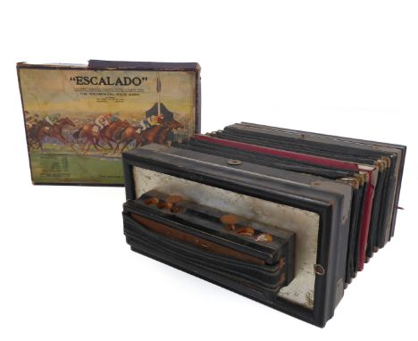 A boxed Chad Valley 'Escalado' horse racing game - with painted lead horses, complete; together with a vintage German piano-k