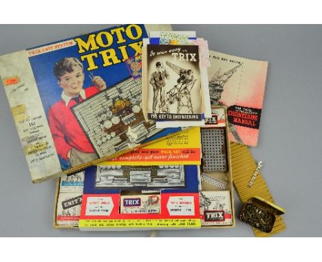 A BOXED TRIX MOTO TRIX 363 SET, comprising 2 x Unit A, B & C supplementary sets, electric motor, tools and The Trix Complete 