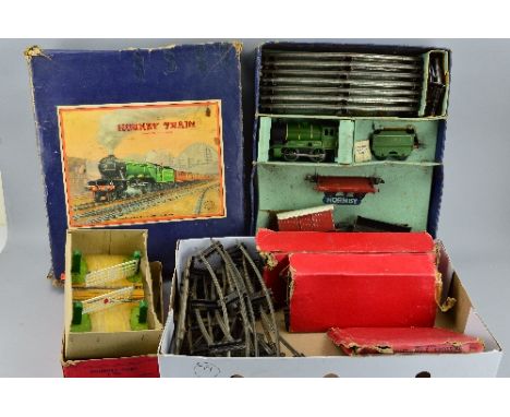 A BOXED HORNBY O GAUGE CLOCKWORK GOODS TRAIN SET, No.601, comprising No.501 0-4-0 locomotive and tender, No.1842, L.N.E.R. gr