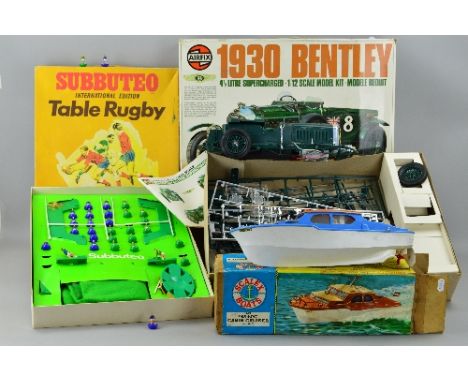 A BOXED SUBBUTEO TABLE RUGBY INTERNATIONAL EDITION, appears largely complete except one set of posts damaged and is missing b