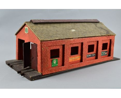 A WOODEN O GAUGE TWO ROAD ENGINE SHED, no makers markings, possibly scratch or kit built, in need of some attention, has some