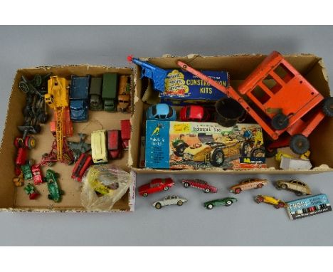 A QUANTITY OF BOXED AND UNBOXED PLAYWORN DIECAST, PLASTIC AND TINPLATE VEHICLES AND ACCESSORIES, to include Jordan & Lewden R