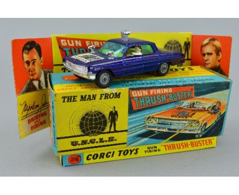 A BOXED CORGI TOYS MAN FROM U.N.C.L.E. OLDSMOBILE 'THRUSH-BUSTER', No.497, metallic purple/blue version with plastic spotligh