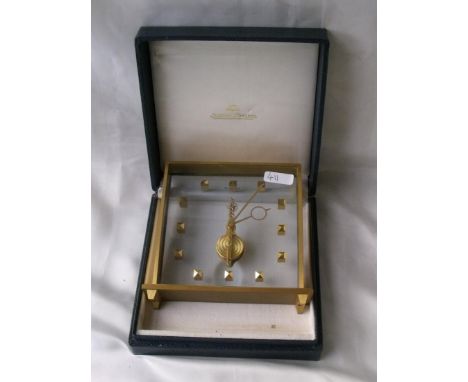 Atmos mantle clock by Jaeger-LeCoultre in a fitted case has an open set of works with glass panel sides and jewelled movement
