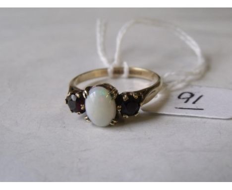 An opal and garnet 9ct three stone ring approx size 'R'        