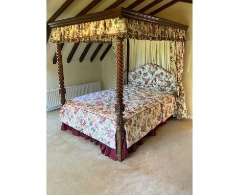 Mid-20th-century mahogany framed four-poster bed of 19th-century design, rectangular canopy with moulded frame supported on t