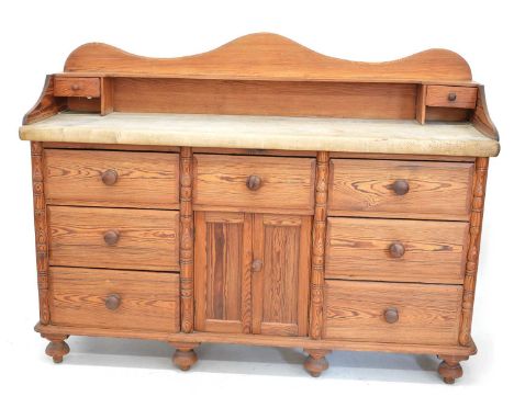 Victorian pitch pine dresser base, serpentine shaped backboard with single shelf and two short drawers, thick sycamore two pl