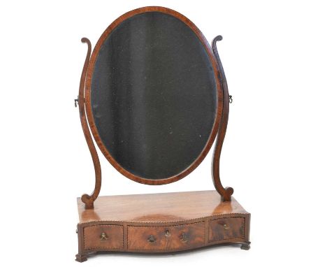 George III mahogany dressing table mirror, oval glass supported on two swept brackets, box base with serpentine front chequer