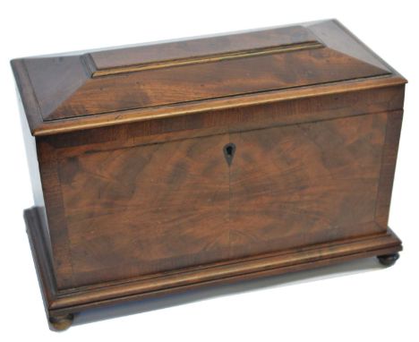 Early 19th-century mahogany sarcophagus-shaped tea caddy, rectangular hinged lid, cross-banded, match figured veneers, tear-d