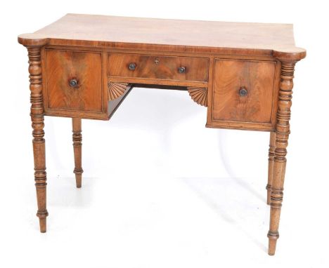 William IV mahogany side table or dressing table, fitted one shallow central drawer, flanked by two deep drawers each with tu