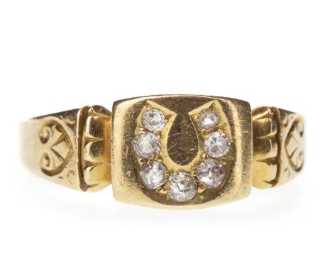 VICTORIAN EIGHTEEN CARAT GOLD DIAMOND RING, the rectangular bezel with a diamond set horseshoe motif, with engraving to the s