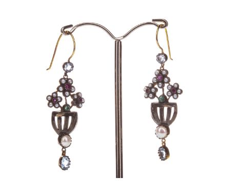 PAIR OF GEM SET FLOWER BASKET EARRINGS, each formed by three red ruby and pearl flower clusters, upon a round emerald, the ba