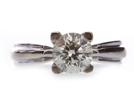 DIAMOND SOLITAIRE RING, the high set round brilliant cut diamond of approximately 1.15 carats, unmarked, size N, 8.2g